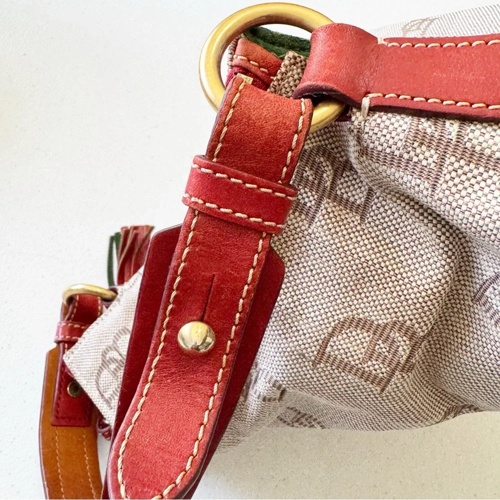 Dooney & Bourke Jacquard Logo Cream Red Tassel Hobo Bag